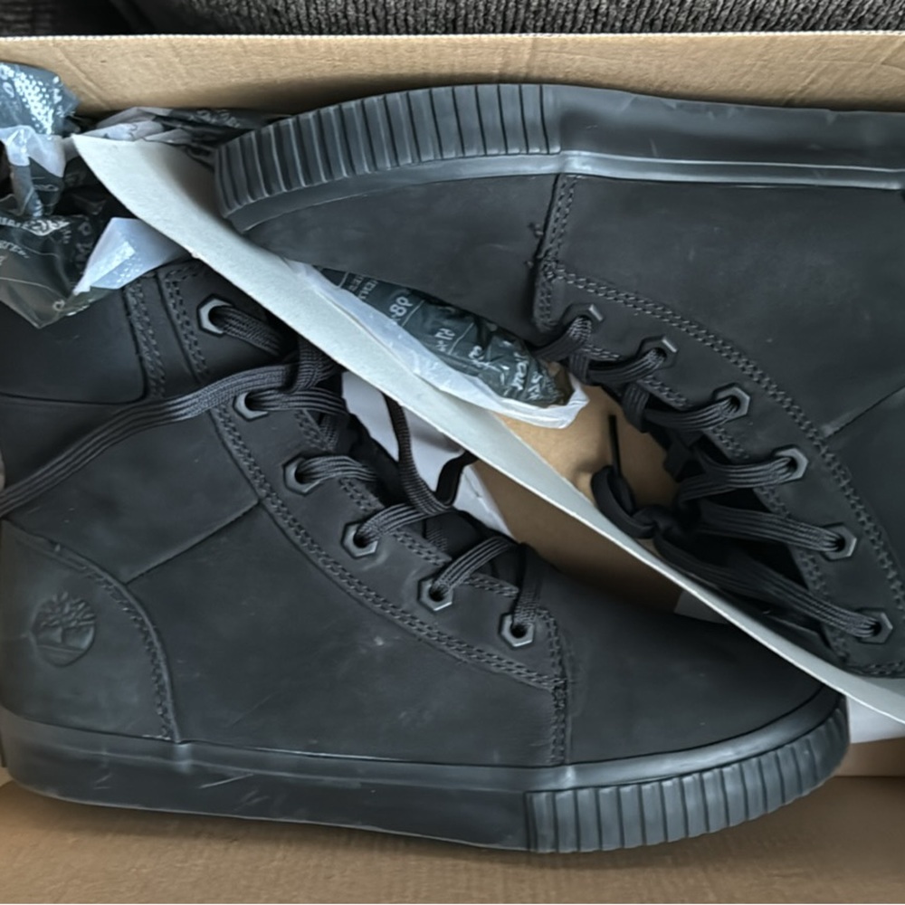 Timberland suede size 8 high top sneakers.